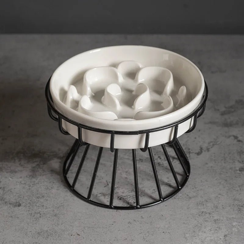 Flower pattern ceramic slow feeder bowl on an elevated black metal stand